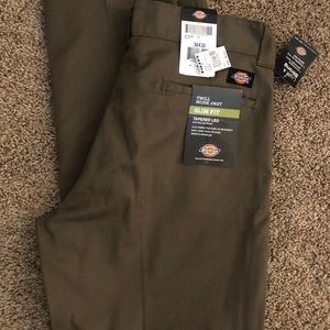 Men’s Dickies slim fit tapered leg.